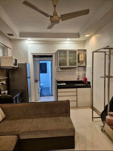 Living Room in 1 BHK Apartment at Santacruz West – for Rent