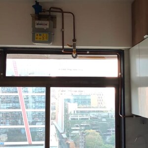 Kitchen in 2 BHK Apartment at Bhoomi Samarth C Wing, Sonawala Industry Estate – for Rent
