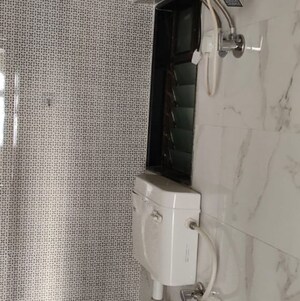 Bathroom in 2 BHK Apartment at Bhoomi Samarth C Wing, Sonawala Industry Estate – for Rent