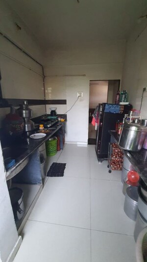 Kitchen in 1 BHK Apartment at Rai Residency Govind Enclave, Kalyan East – for Sale