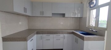 Kitchen in 3 BHK Builder Floor at Puri Aman Vilas, Sector 89 – for Sale