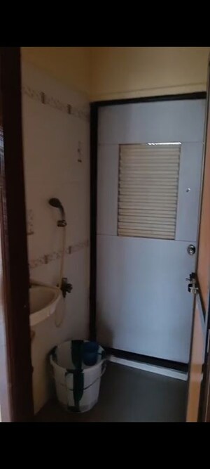 Bathroom in 2 BHK Apartment at Harshail Flamingo Apartments, Malad West – for Rent