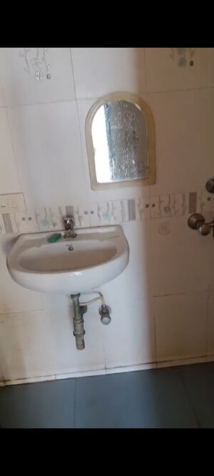 Bathroom in 1 BHK Apartment at Harshail Flamingo Apartments, Malad West – for Rent