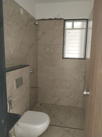 Bathroom in 2 BHK Apartment at Magarpatta Grevillea, Hadapsar – for Sale