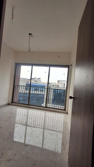 Room in 2 BHK Apartment at Crystal Paradise Residences, Andheri East – for Sale