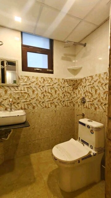 Bathroom in 2 BHK Apartment at Palm Residency Chhatarpur, Chattarpur – for Rent