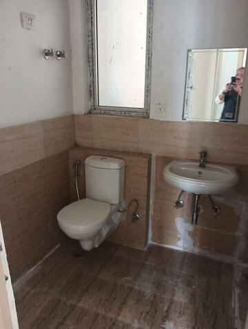 Bathroom in Studio Apartment at Gaur Yamuna City, Gaur Yamuna City – for Sale