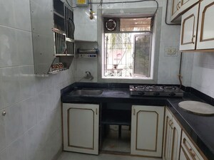 Kitchen in 1 BHK Apartment at Vaishali Nagar CHS, Mulund West – for Sale