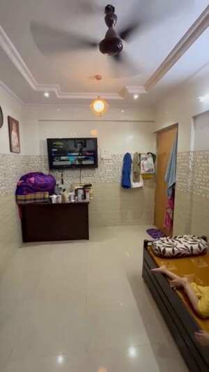 Bedroom in 1 BHK Apartment at Woodland Complex, Naigaon East – for Rent