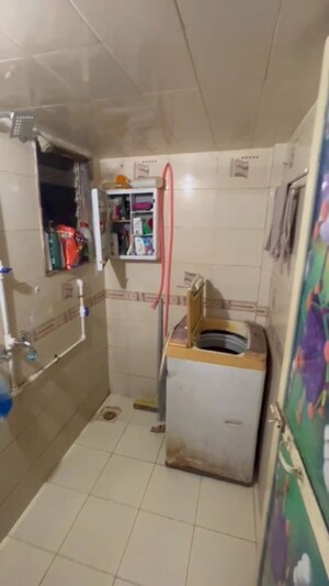 Bathroom in 1 BHK Apartment at Woodland Complex, Naigaon East – for Rent