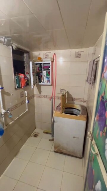 Bathroom in 1 BHK Apartment at Woodland Complex, Naigaon East – for Rent