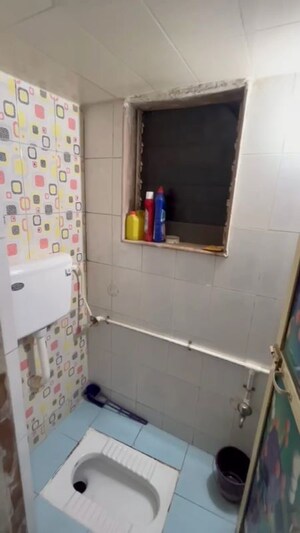 Bathroom in 1 BHK Apartment at Woodland Complex, Naigaon East – for Rent