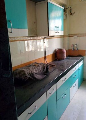 Kitchen in 2 BHK Apartment at Lodha Paradise, Majiwada – for Rent