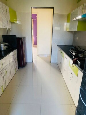 Kitchen in 3 BHK Apartment at Puranik Rumah Bali, Ghodbunder Road – for Rent