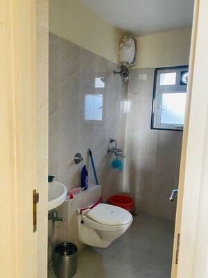 Bathroom in 3 BHK Apartment at Puranik Rumah Bali, Ghodbunder Road – for Rent