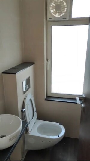 Bathroom in 1 BHK Apartment at Omkar Signet, Malad East – for Rent