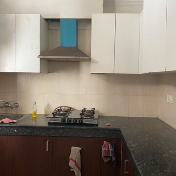 Kitchen in 2 BHK Apartment at Maya Garden City, Nagla Road – for Rent