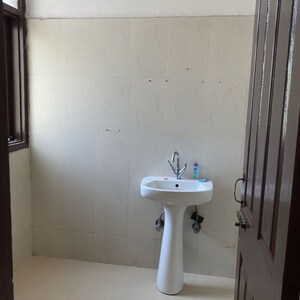 Bathroom in 2 BHK Apartment at Maya Garden City, Nagla Road – for Rent