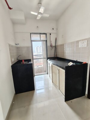 Kitchen in 1 BHK Apartment at JP North Aviva, Mira Road – for Sale