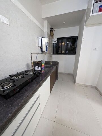Kitchen in 2 BHK Apartment at Duville Riverdale Heights, Kharadi – for Rent