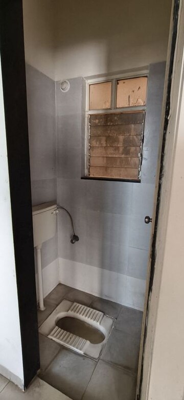 Bathroom in 1 BHK Apartment at Gulmohar Helios, Kharadi – for Rent