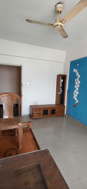 Living Room in 1 BHK Apartment at Gulmohar Helios, Kharadi – for Rent