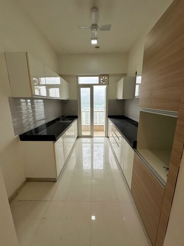 Kitchen in 2 BHK Apartment at Omkar Alta Monte, Malad East – for Rent