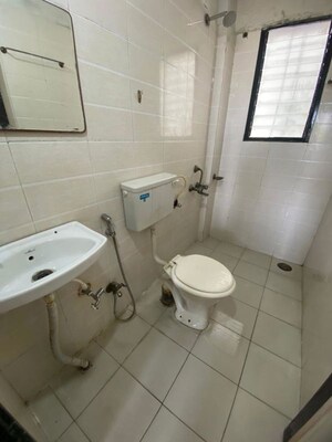 Bathroom in 2 BHK Apartment at Jagdish Nagar CHS, Aundh – for Rent