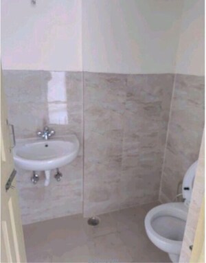 Bathroom in 1 BHK Apartment at Wave Dream Homes, Wave City – for Sale