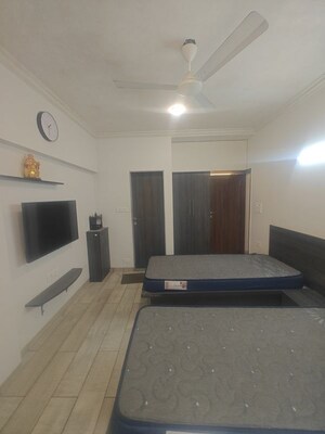 Bedroom in 2.5 BHK Apartment at NRI Complex Phase I, Seawoods Sector 58 – for Rent