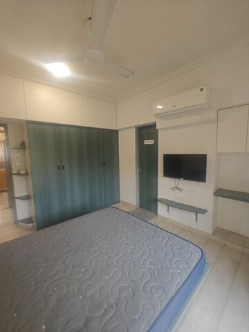 Bedroom in 2.5 BHK Apartment at NRI Complex Phase I, Seawoods Sector 58 – for Rent