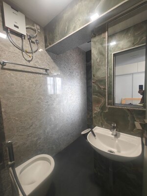 Bathroom in 2.5 BHK Apartment at NRI Complex Phase I, Seawoods Sector 58 – for Rent