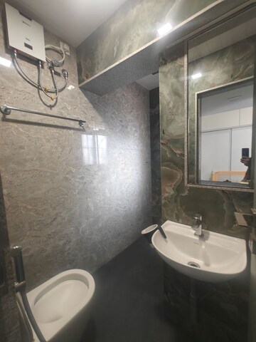 Bathroom in 2.5 BHK Apartment at NRI Complex Phase I, Seawoods Sector 58 – for Rent