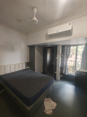 Bedroom in 2.5 BHK Apartment at NRI Complex Phase I, Seawoods Sector 58 – for Rent