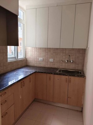Kitchen in 2.5 BHK Apartment at Amrapali Dream Valley – for Rent