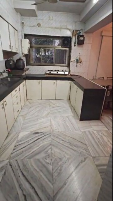 Kitchen in 4 BHK Apartment at Mahalaxmi Apartment, Ghatkopar West – for Sale