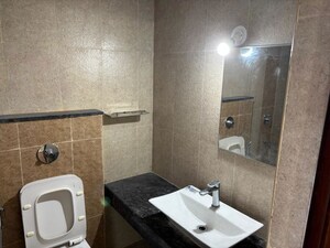 Bathroom in 3 BHK Apartment at Puravankara Silversands, Mundhwa – for Rent