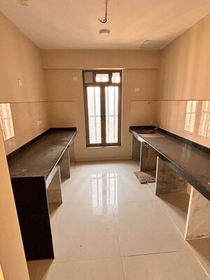 Kitchen in 1.5 BHK Apartment at Siddha Seabrook, Kandivali West – for Sale
