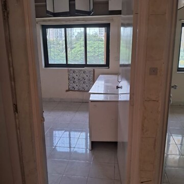 Room in 1 BHK Apartment at Lokhandwala – for Rent