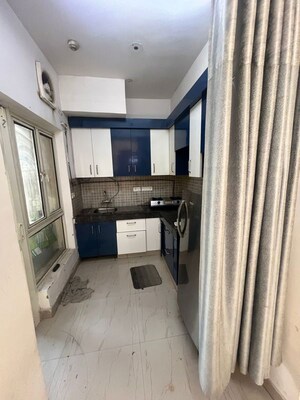 Kitchen in 2 BHK Apartment at Paramount Floraville, Sector 137 – for Sale