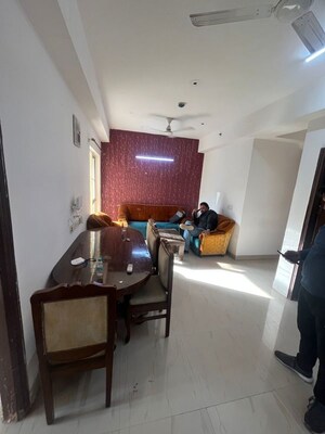 Living Room in 2 BHK Apartment at Paramount Floraville, Sector 137 – for Sale
