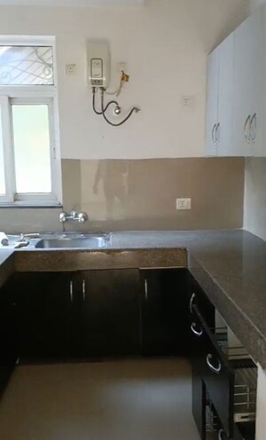 Kitchen in 4 BHK Apartment at Emaar MGF Emerald Hills, Sector 65 – for Rent