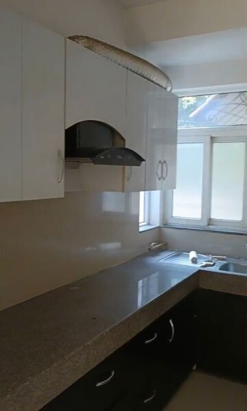 Kitchen in 4 BHK Apartment at Emaar MGF Emerald Hills, Sector 65 – for Rent