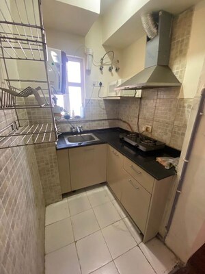 Kitchen in 1 RK Apartment at Ajnara Daffodil, Sector 137 – for Rent