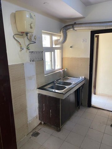 Kitchen in 3.5 BHK Apartment at BPTP Park Grandeura, Sector 82 – for Sale