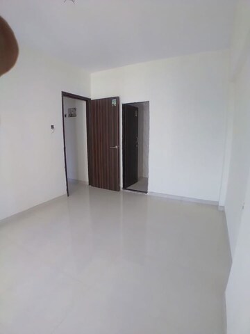 Room in 1 BHK Apartment at Dharti Presidio, Malad West – for Rent