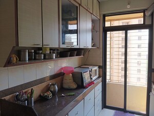 Kitchen in 2 BHK Apartment at Rustomjee Riviera, Malad West – for Rent