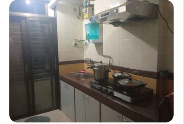 Kitchen in 2 BHK Apartment at Rustomjee Riviera, Malad West – for Rent