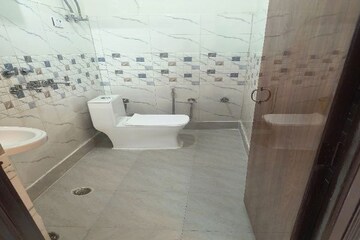 Bathroom in 3 BHK Builder Floor at Dwarka Mor – for Sale