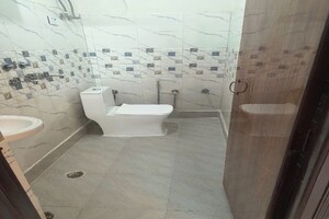 Bathroom in 3 BHK Builder Floor at Dwarka Mor – for Sale